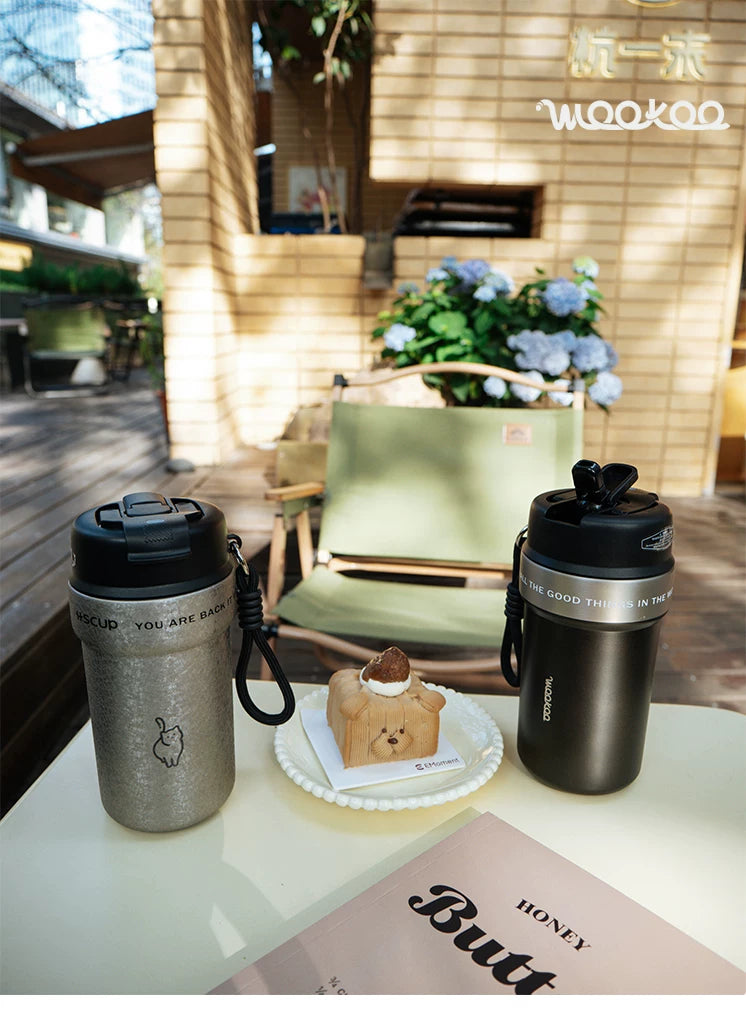Wookoo cat tumbler, 304 stainless steel coffee cup with carry lanyard, close-up view