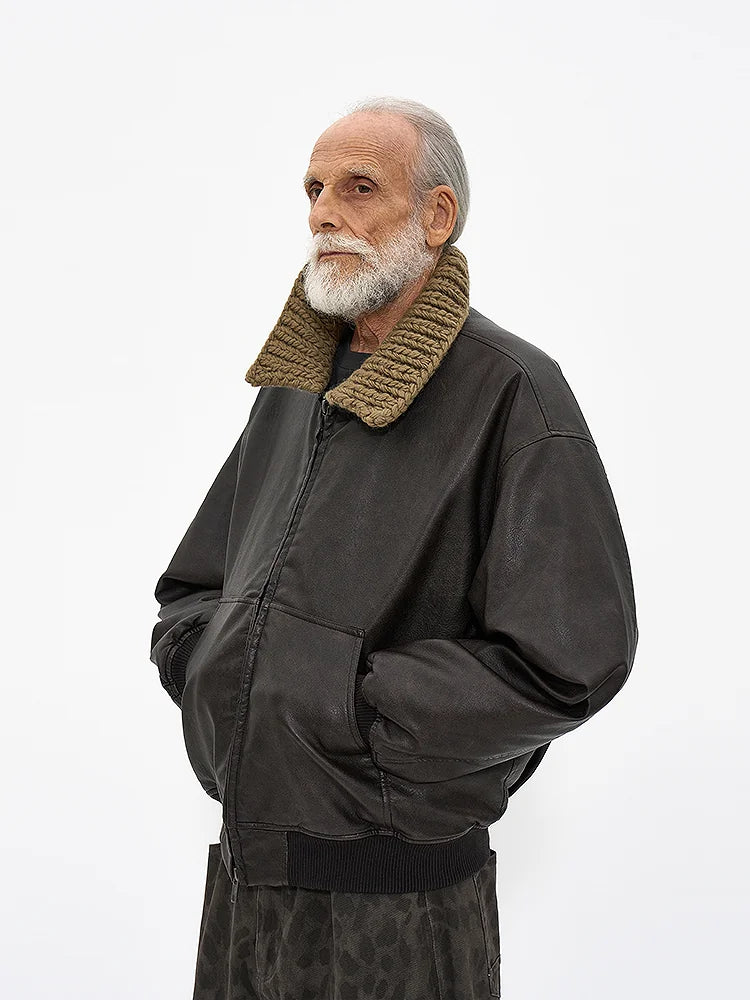 Partimento quilted leather jacket with handmade knit collar