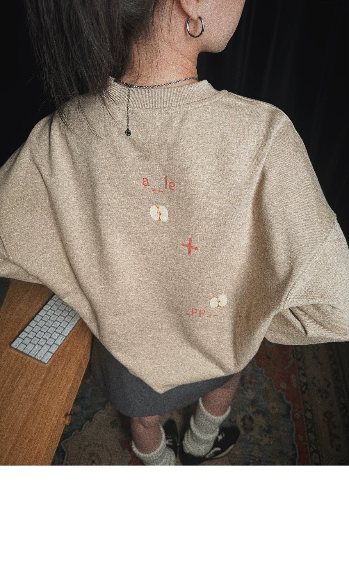 Pixel apple embroidered hoodie, side view