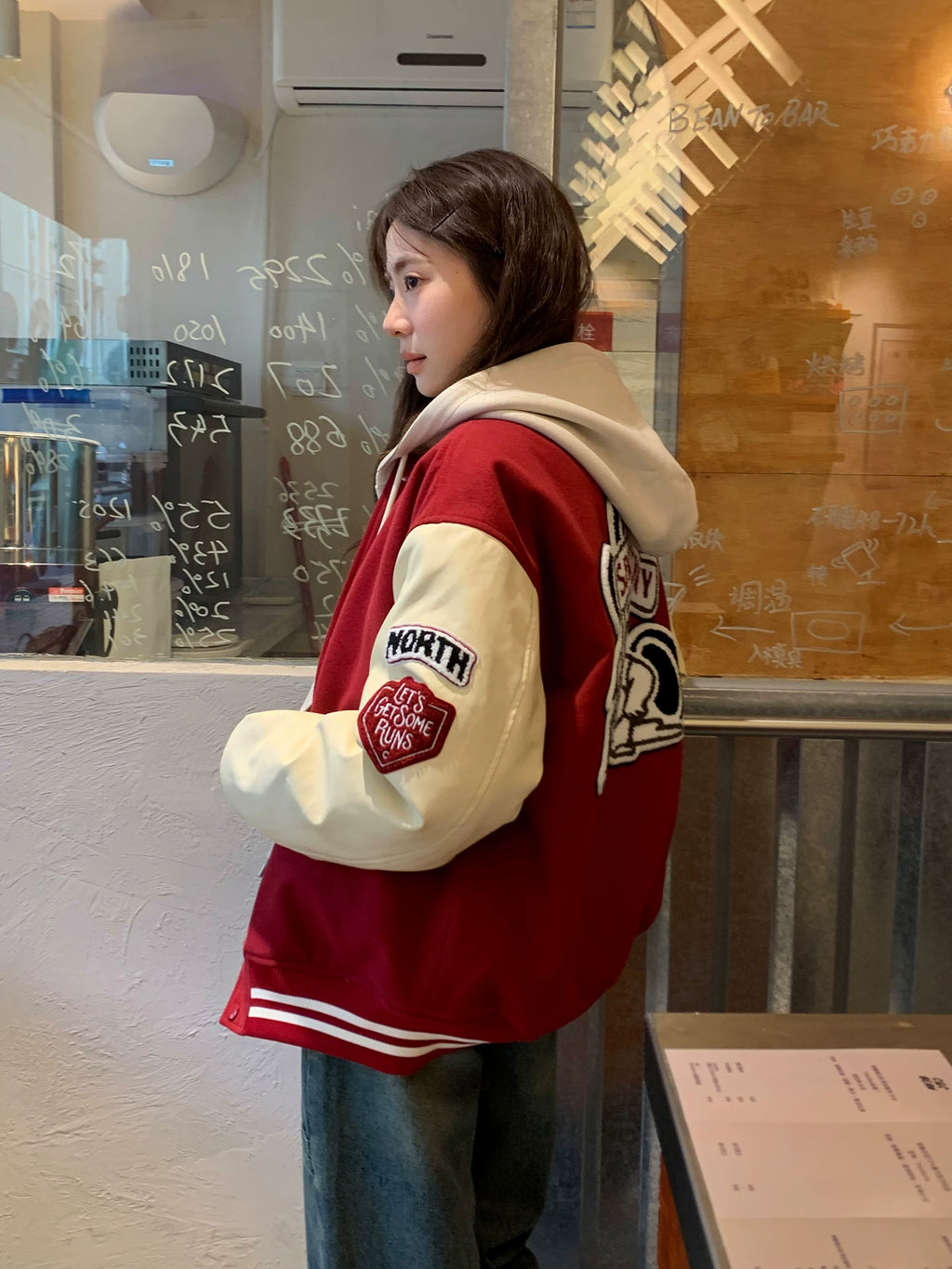 Women's vintage bear chenille embroidered varsity jacket with PU leather sleeves, detail view