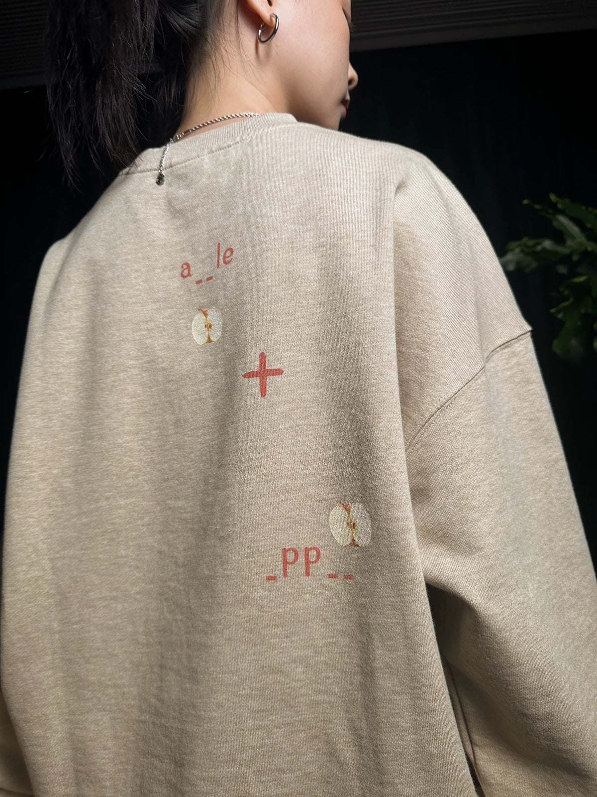 Pixel apple embroidered hoodie, back view
