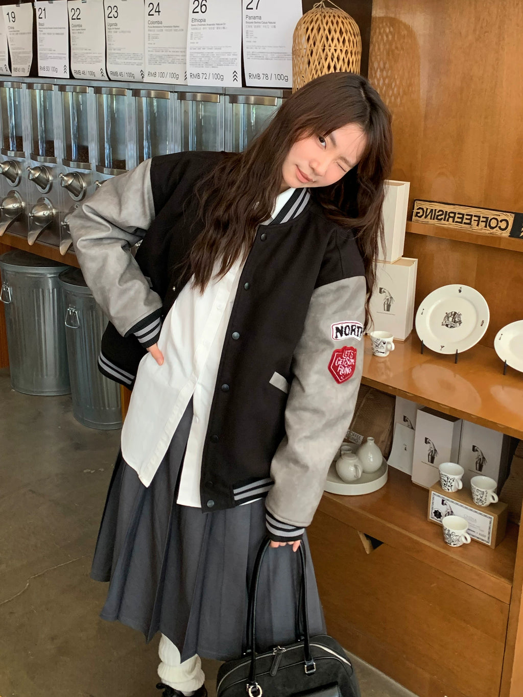 Women's vintage bear chenille embroidered varsity jacket with PU leather sleeves, side view