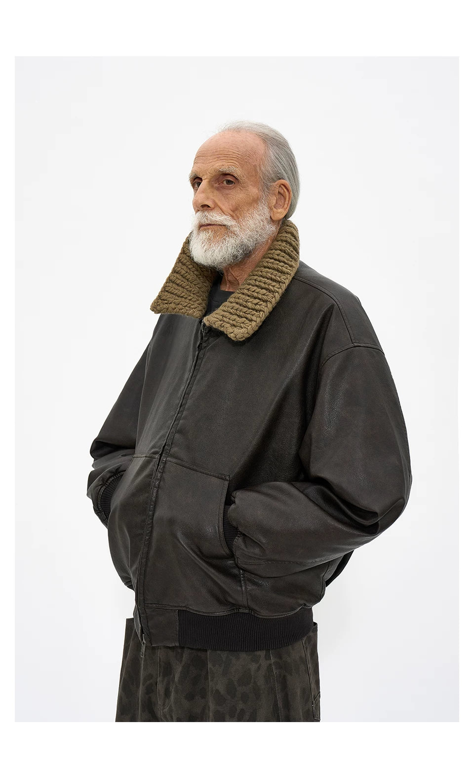 Partimento quilted leather jacket with handmade knit collar, close-up view