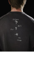 Old notes embroidered vintage band t-shirt, side view