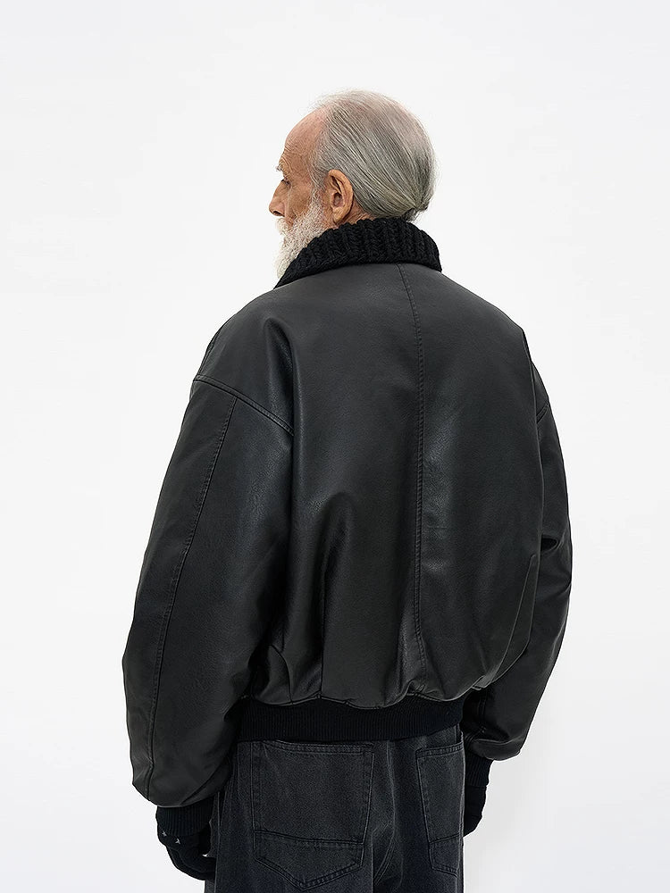 Partimento quilted leather jacket with handmade knit collar, side view