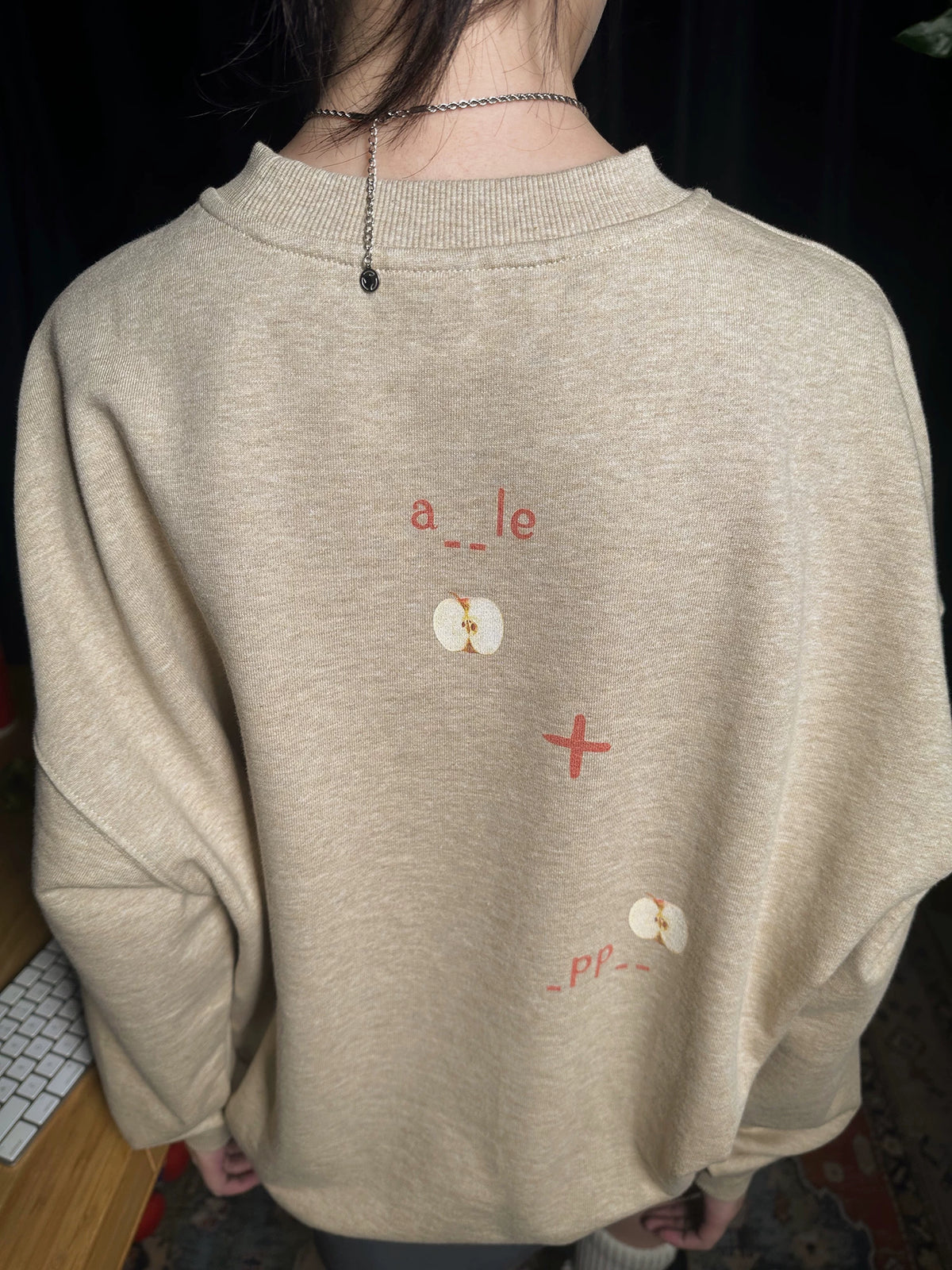 Pixel apple embroidered hoodie, on model