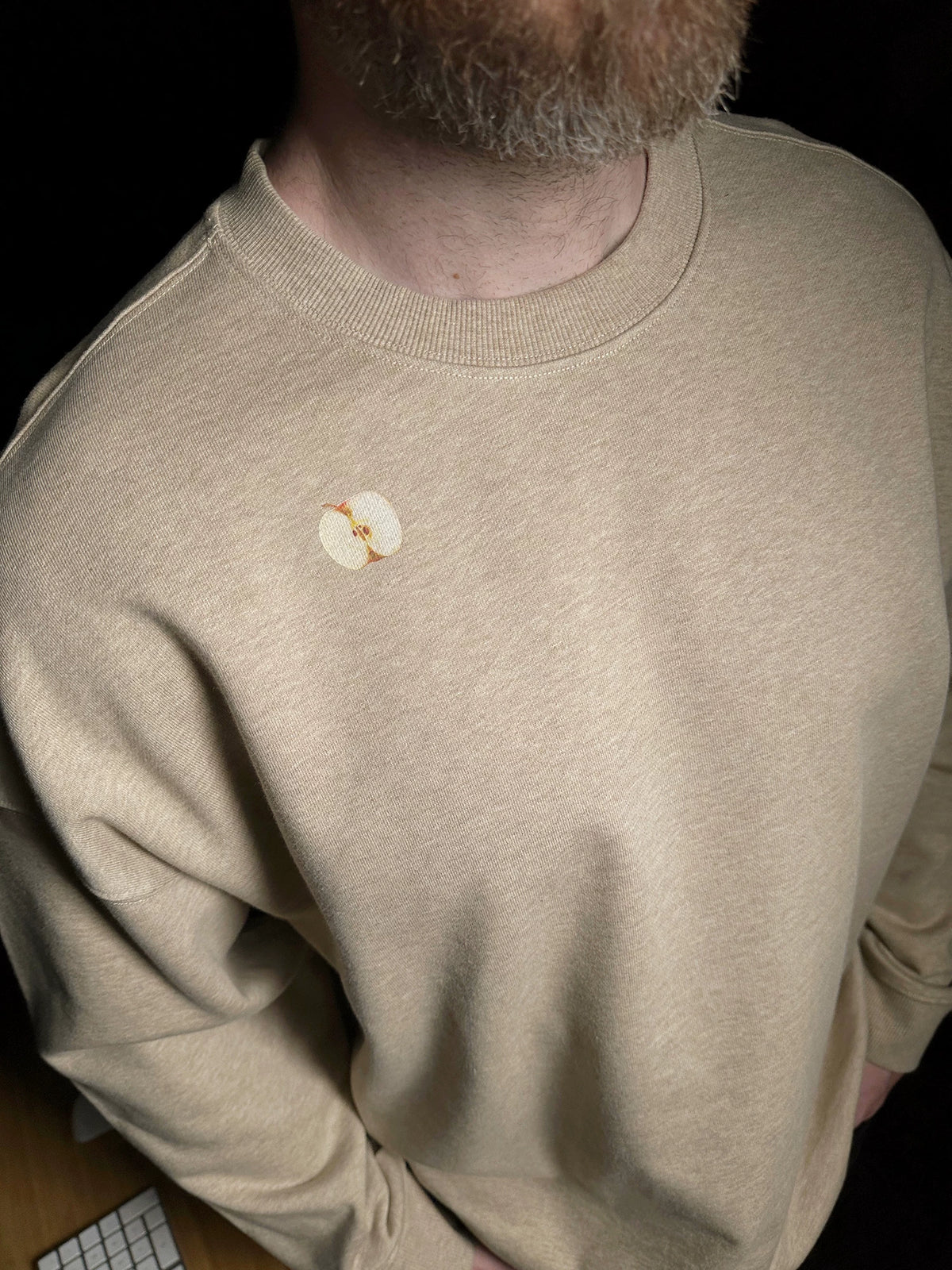 Pixel apple embroidered hoodie, detail shot