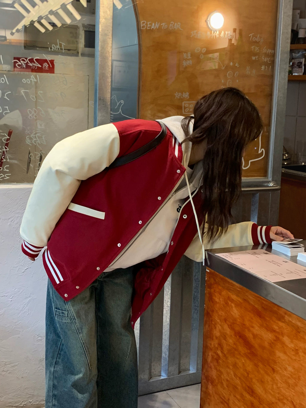 Women's vintage bear chenille embroidered varsity jacket with PU leather sleeves, back view