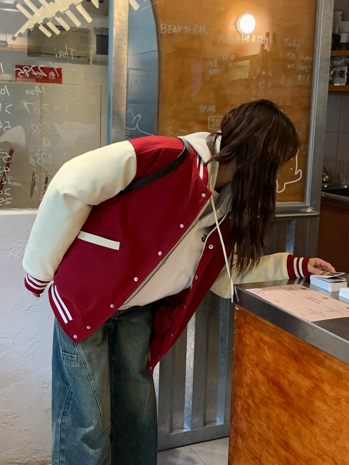 Women's vintage bear chenille embroidered varsity jacket with PU leather sleeves, back view