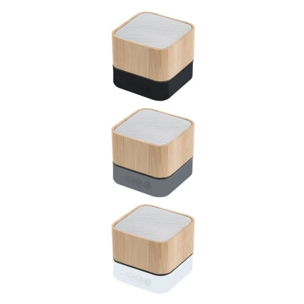 Wireless bamboo speaker with logo engraving area visible
