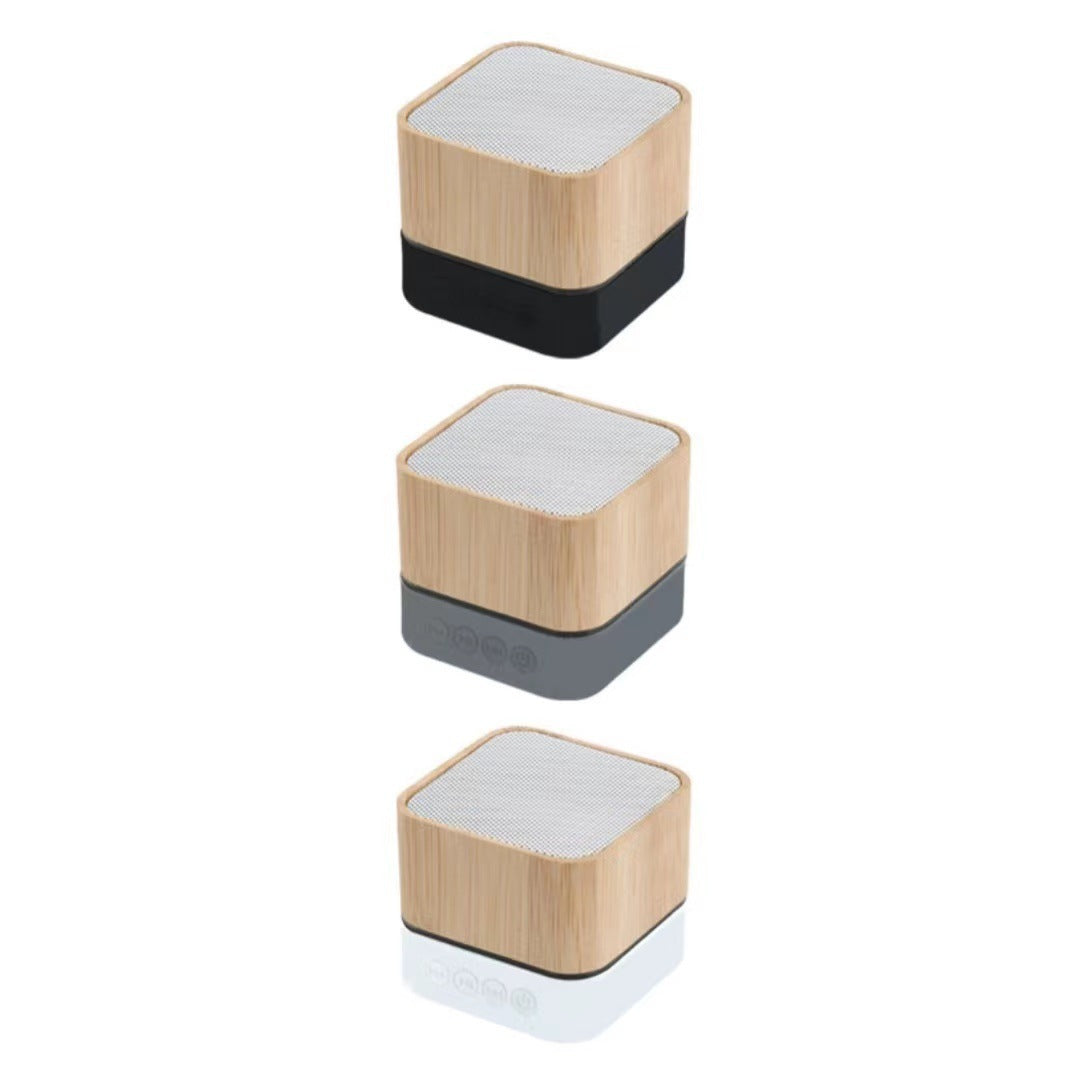 Wireless bamboo speaker with logo engraving area visible